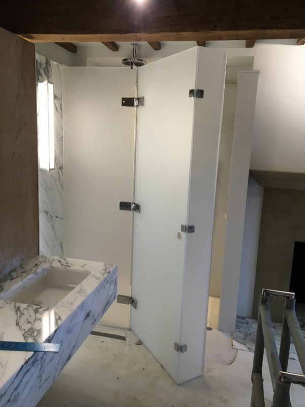 Bespoke frosted glass shower enclosure in Earlsfield luxury bathroom
